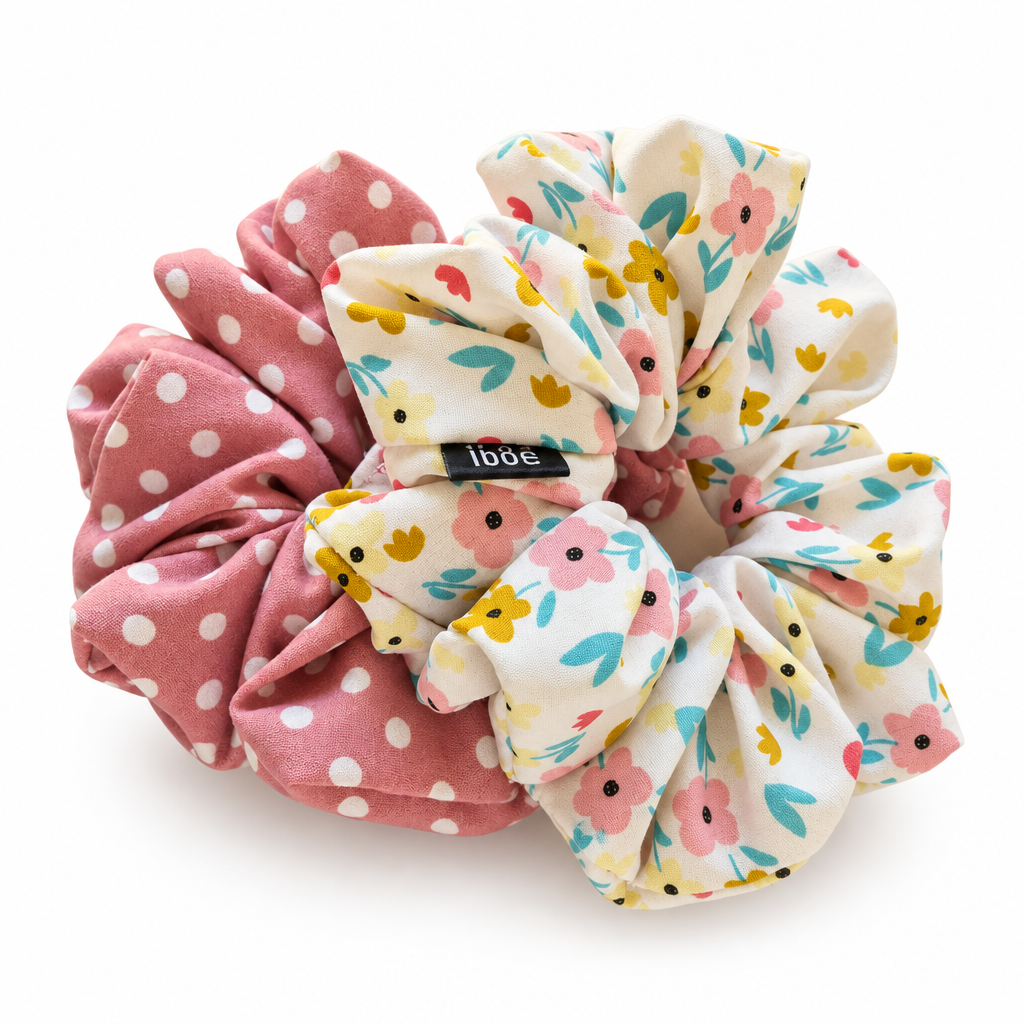 Floral and pink polka-dot scrunchies on pure white